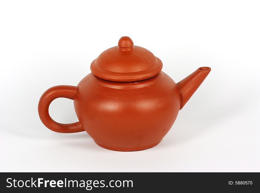 Red clay Chinese tea pot on white background