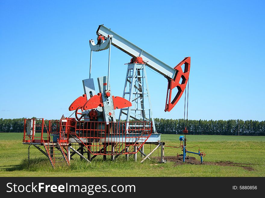 Working Oil Pump Jack In a field