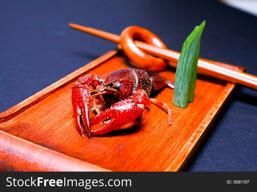 Seafood crayfish in a wooden plate. Seafood crayfish in a wooden plate.