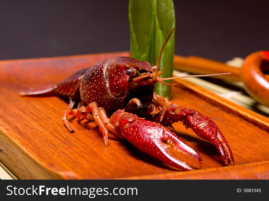 Seafood crayfish in a wooden plate. Seafood crayfish in a wooden plate.