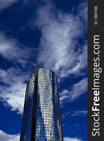 Skyscraper and sky with clouds