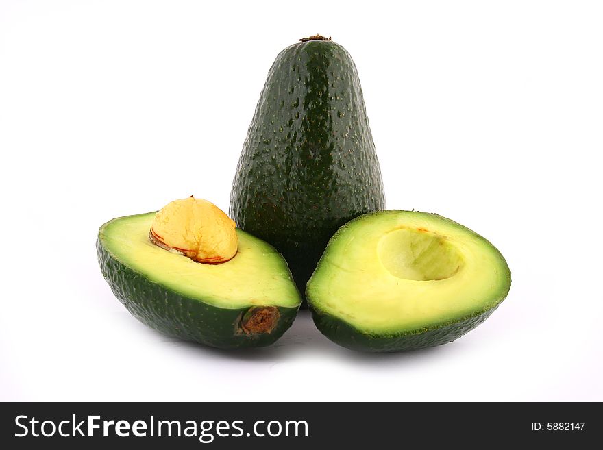 Fresh avocados isolated on white background