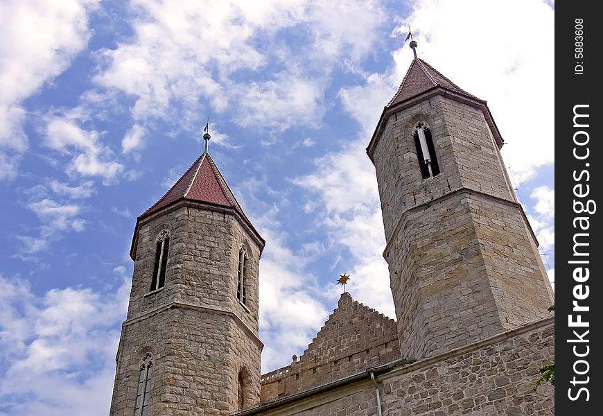 Two tower of the old historical church on background of blue sky. Two tower of the old historical church on background of blue sky