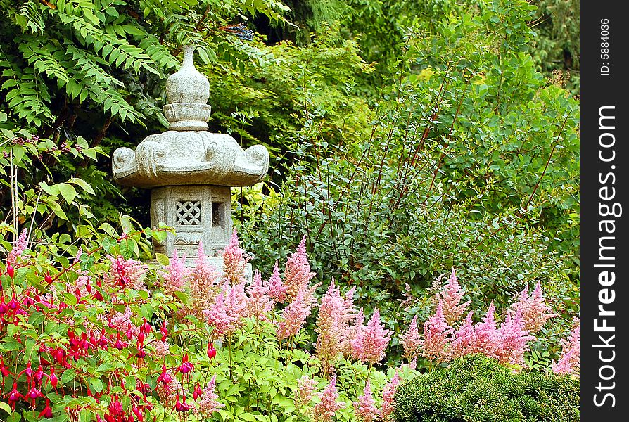 Japanese garden with ornamental statue. Japanese garden with ornamental statue