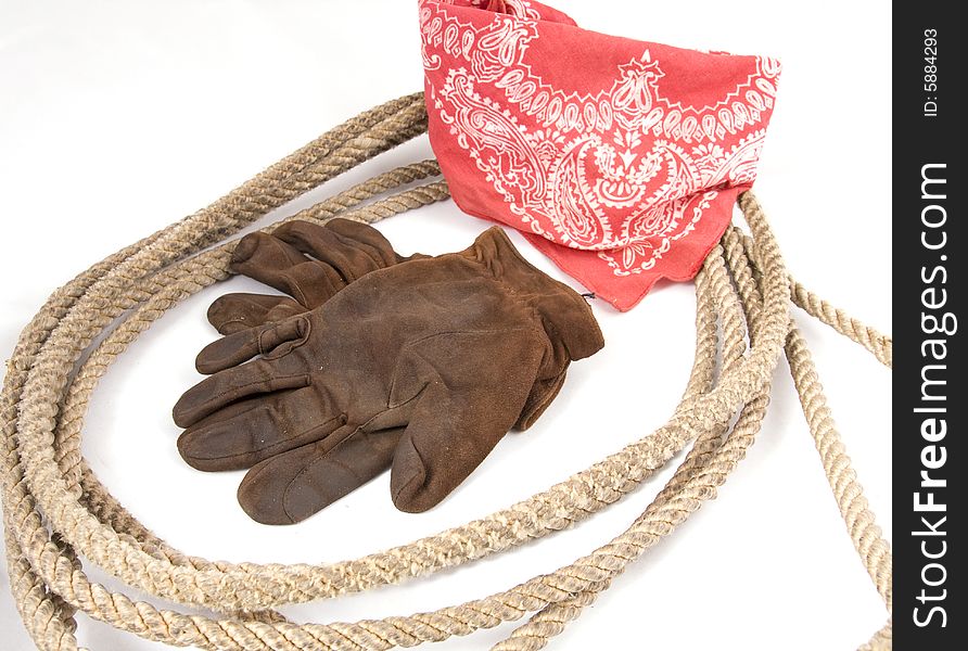 Cowboy gear - western riding equipment, gloves and rope