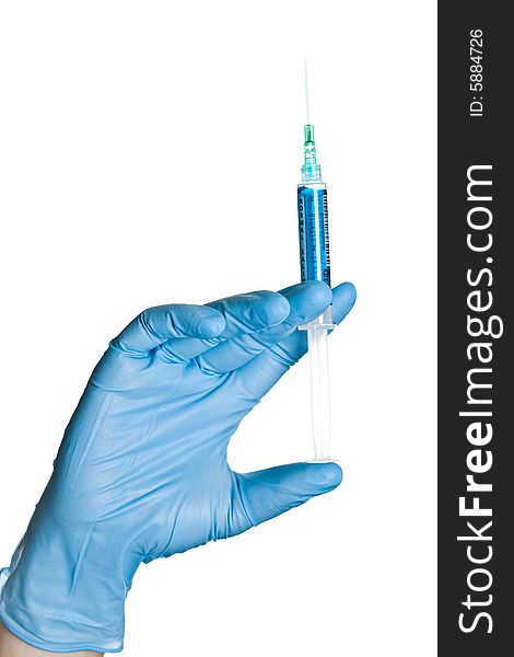 Hand In Blue Glove Holding Syringe