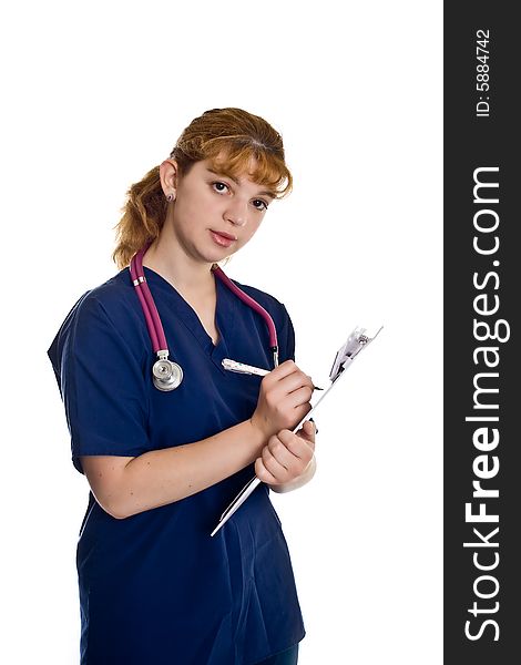 Young female doctor with stethoscope and writing pad over white background