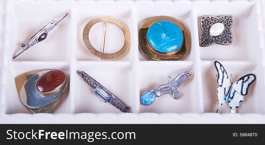 Many pieces of jewelry in a nice jewelry box. Many pieces of jewelry in a nice jewelry box