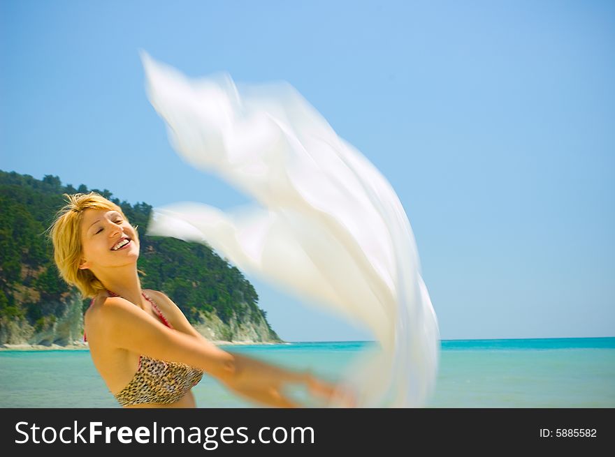 Woman relaxing on the beach