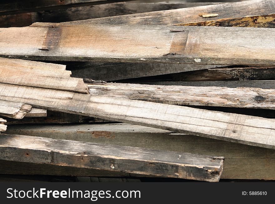 An image of a pile of planks. An image of a pile of planks