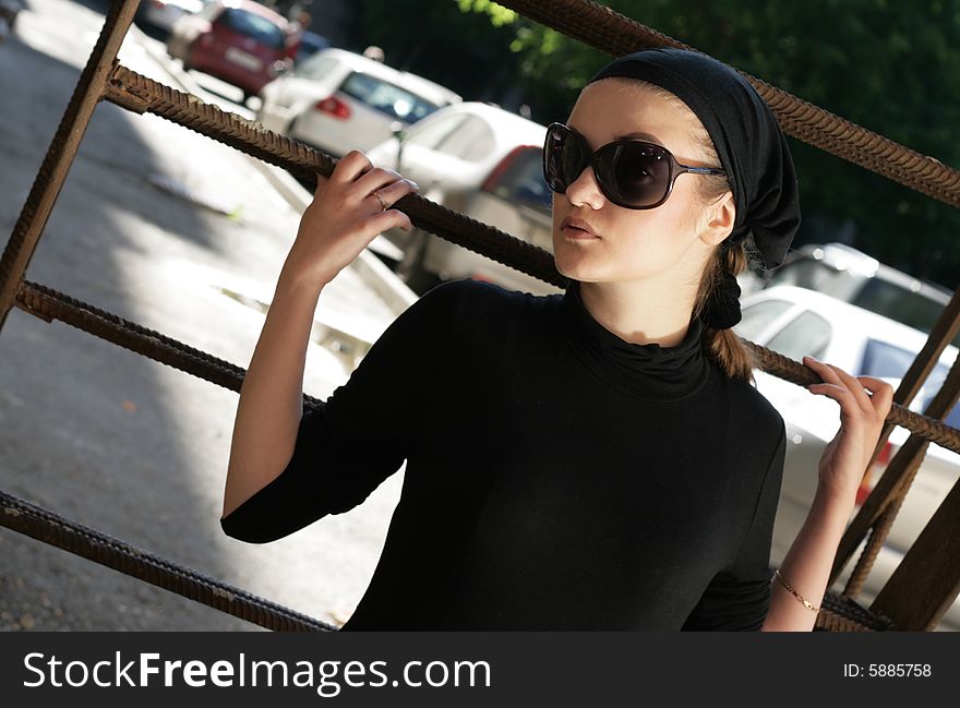 Beautiful Woman near Rusty Stairs. Beautiful Woman near Rusty Stairs