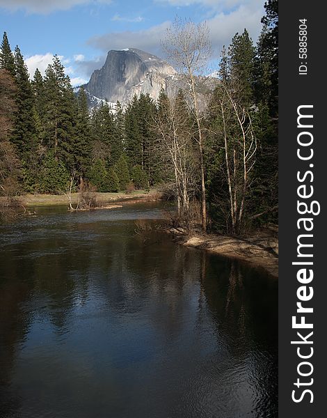Half Dome in Yosemite National Park with the Merced River in the foreground