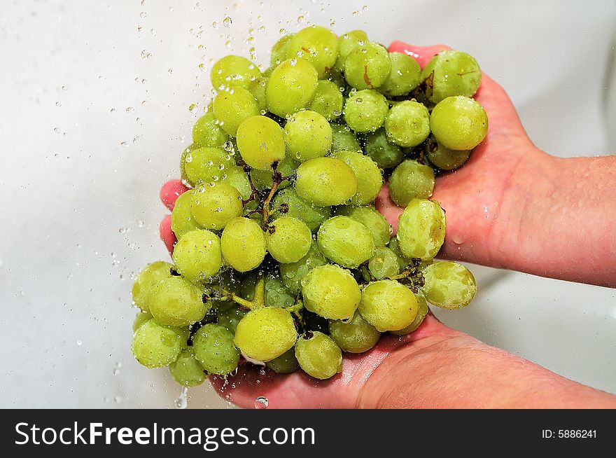Grape on palm-Wash fruits before meal