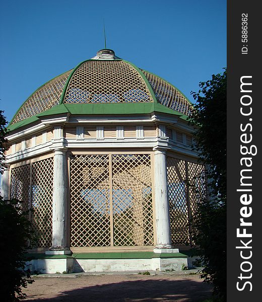 Open-air cage for greater birds in ancient manor Sheremetev Kuskovo's column in Moscow