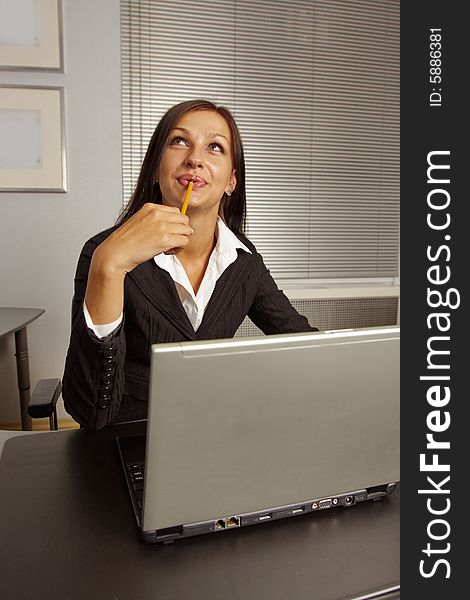 Businesswoman Sitting In Office