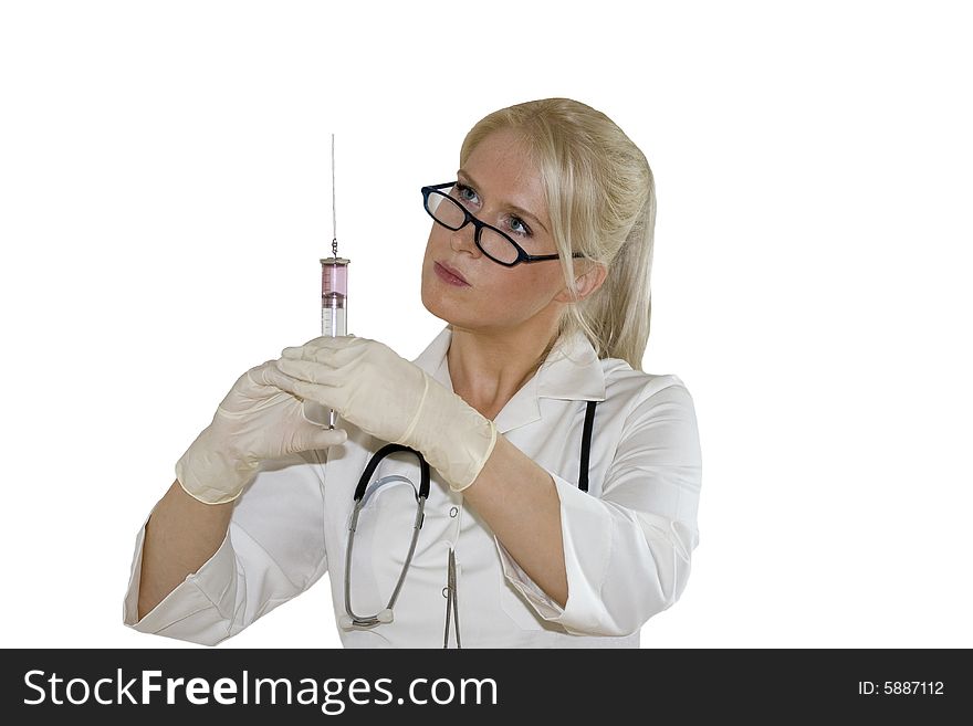 A Young Female Doctor/nurse Using A Syringe