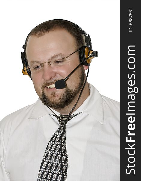 Male customer Representative with headset smiling during a telephone conversation
isolated. Male customer Representative with headset smiling during a telephone conversation
isolated