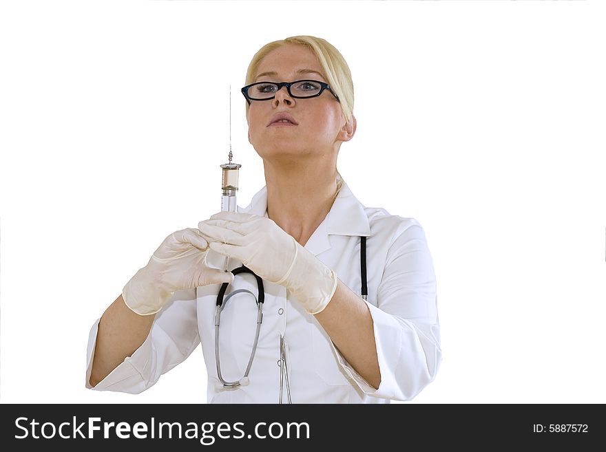 A young female doctor/nurse prepares to make an injection isolated on white background