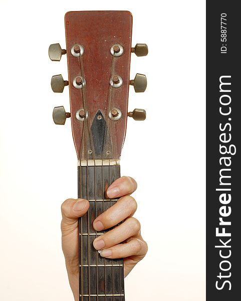 Women Hand Is Holding The Guitar
