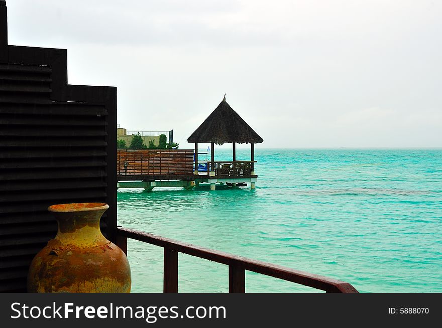 Island of Paradise. White sand beaches with coco-tree and crystal blue water. Maldives. Luxury holidays. Island of Paradise. White sand beaches with coco-tree and crystal blue water. Maldives. Luxury holidays.