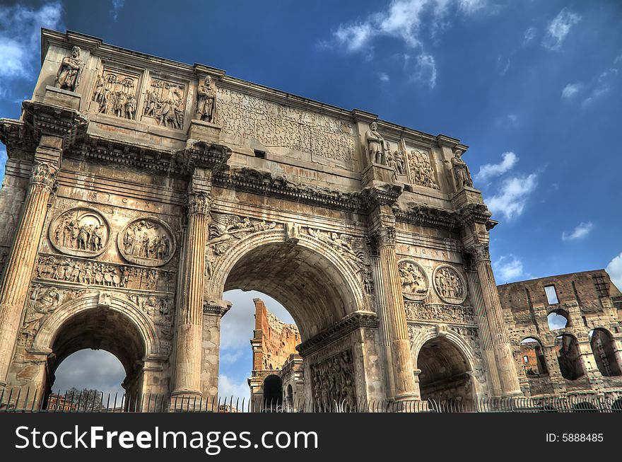 HDR image of the Roman Arch of Constantine and Colosseum.