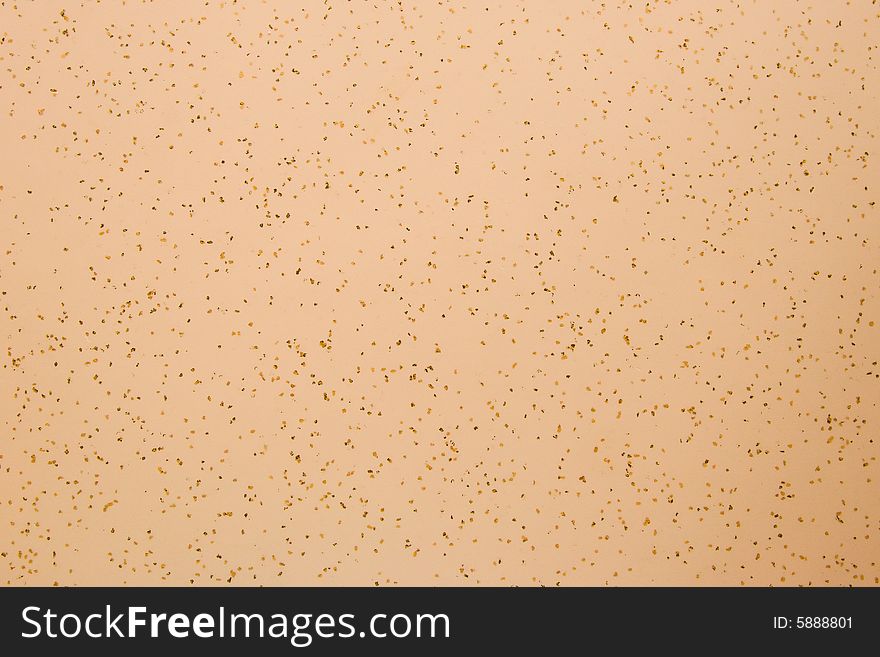 Brown plastic background with spots