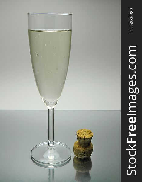 Flutes of sparkling wine isolated against a white background