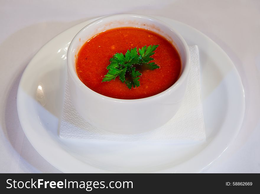 Fresh tasty tomato soup in a bowl closeup