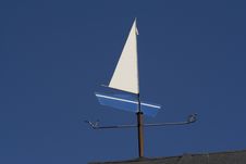 Weather Vane - Blue Boat Stock Photo Weather Vane - Blue Boat Stock Photo