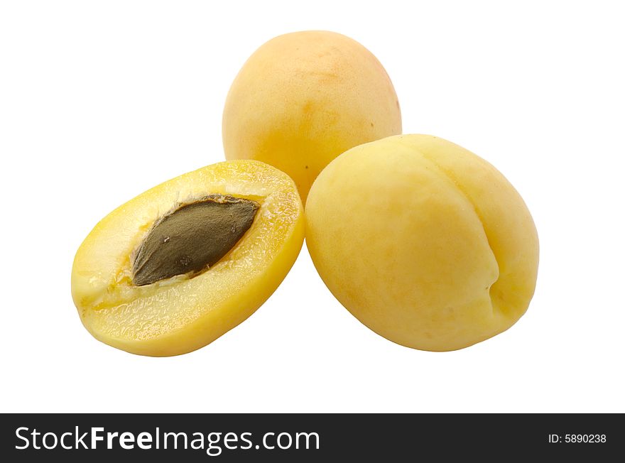 Ripe, juicy apricots on a white background