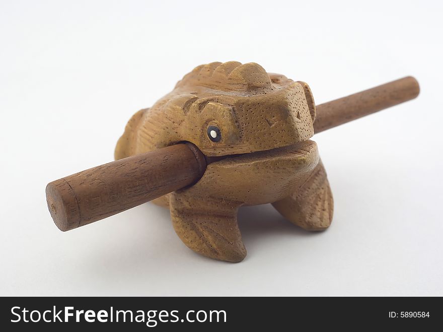 Ethnic toy- wooden frog from Canarian islands