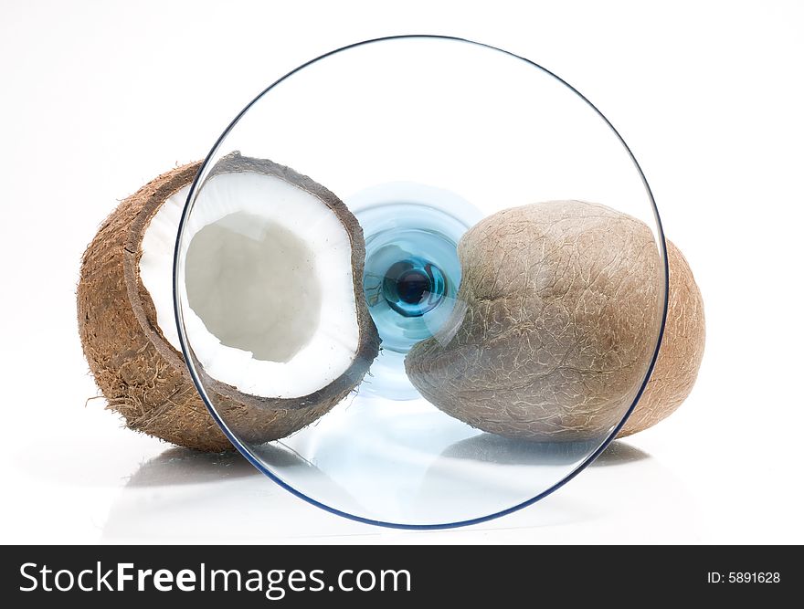 Coconuts isolated on white with martini glass. Coconuts isolated on white with martini glass