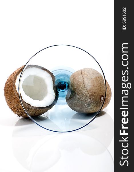 Coconuts isolated on white with martini glass. Coconuts isolated on white with martini glass