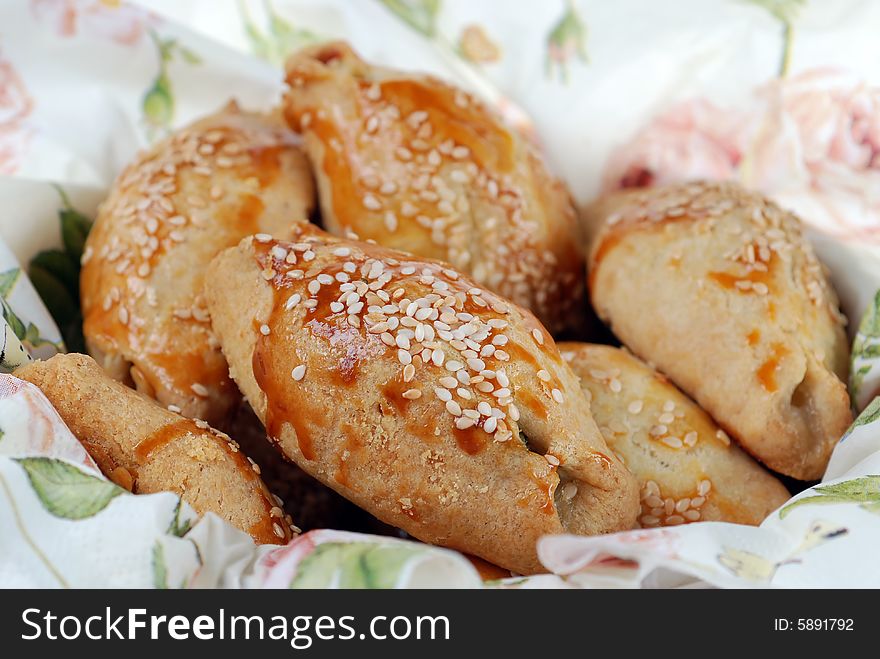 Homemade cheese cookies coated with sesame seeds