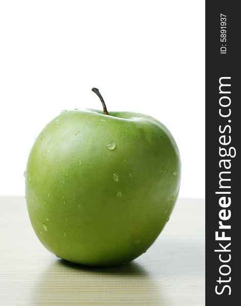 Delicious fresh green Apple on cutting board