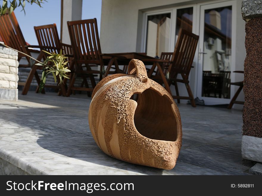 Open vase on a terrace. Open vase on a terrace