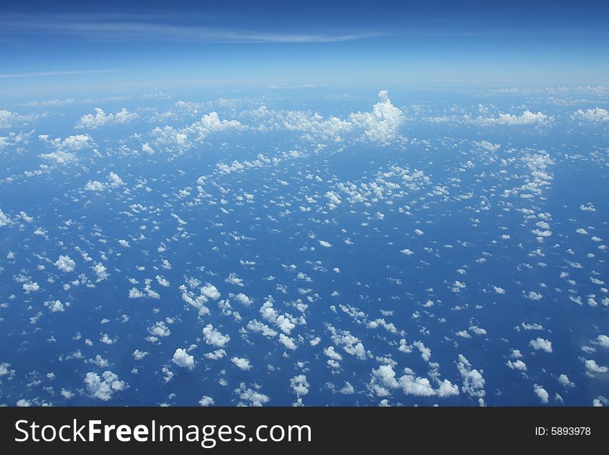 Clouds over pacific ocean, this good weather makes air passenger comfortable. Clouds over pacific ocean, this good weather makes air passenger comfortable