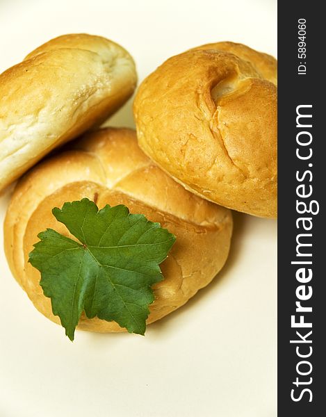 Bread roll on kitchen table.