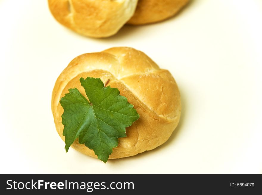 Bread roll on kitchen table.