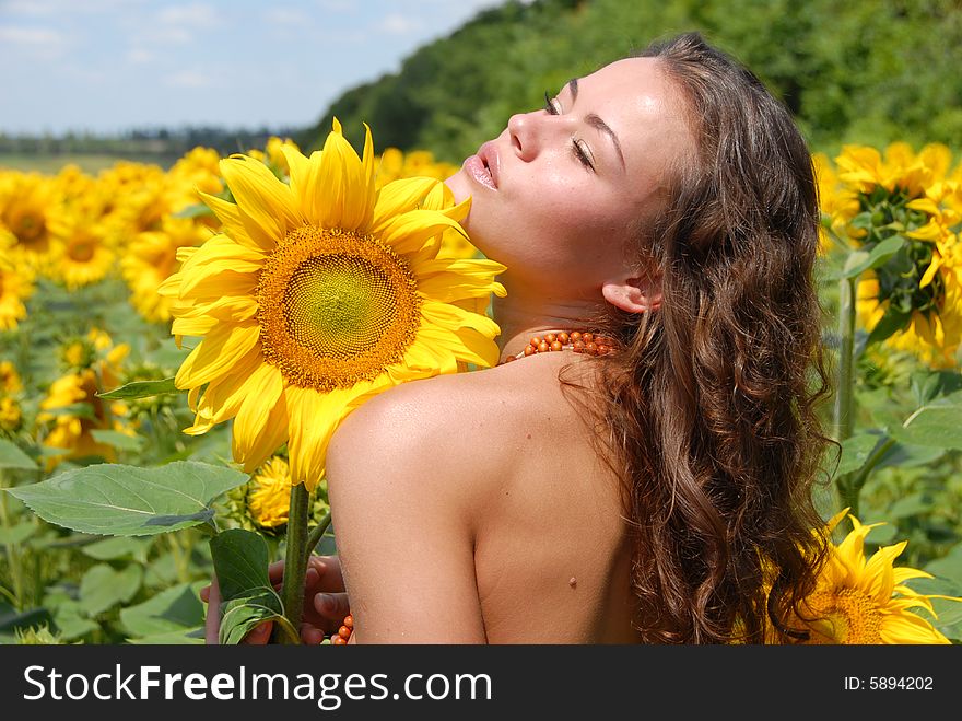 Portrait of the beautiful girl with flowers. Portrait of the beautiful girl with flowers
