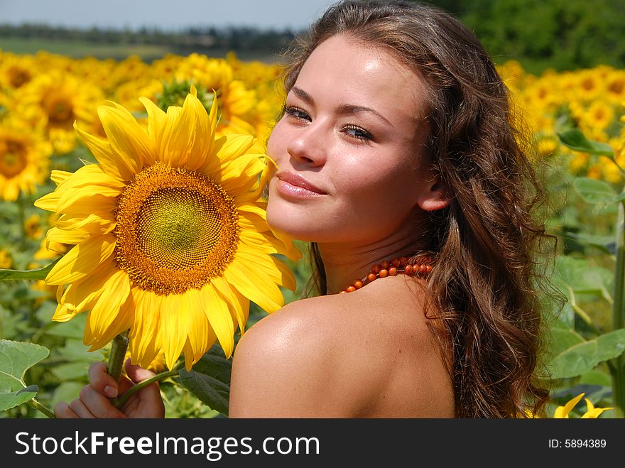 Portrait of the beautiful girl with flowers. Portrait of the beautiful girl with flowers