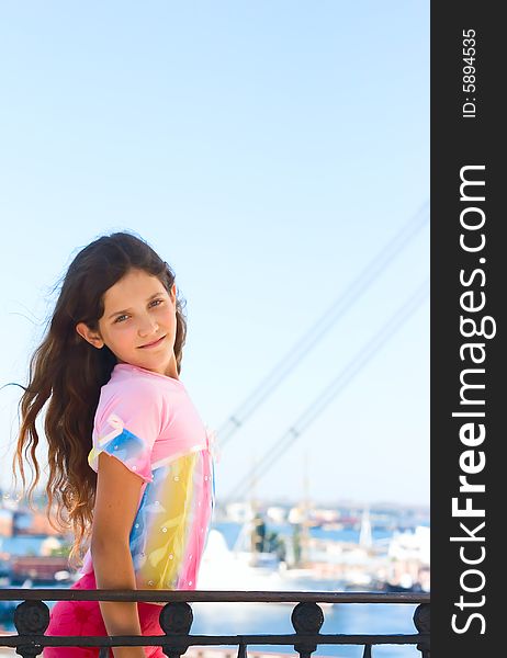 Girl on sea port background for your design