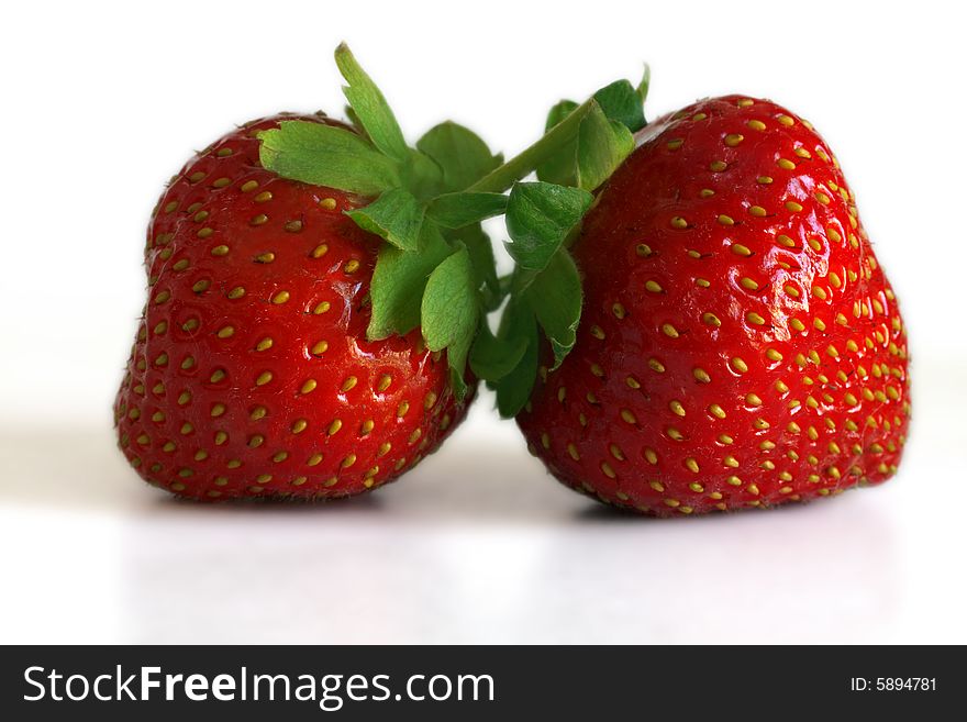 Berries of a fresh, ripe strawberry on a white background