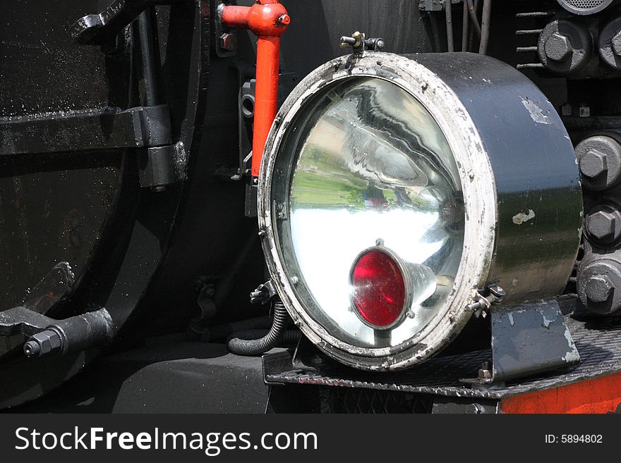 Old steam locomotive lamp close-up. Old steam locomotive lamp close-up