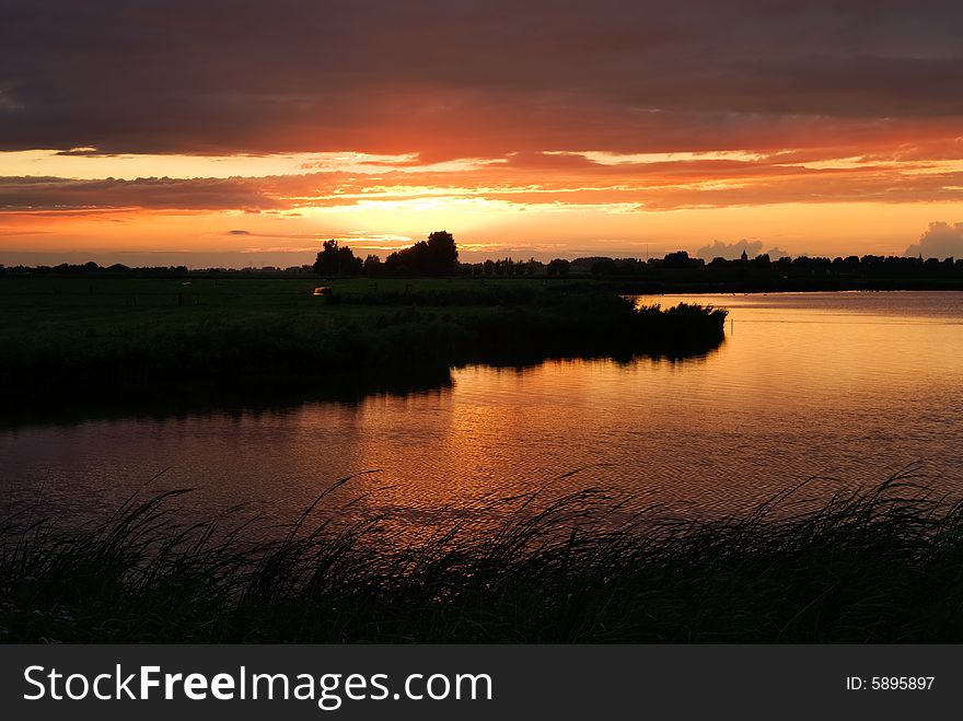 Beautiful sunset at a lake in the netherlands