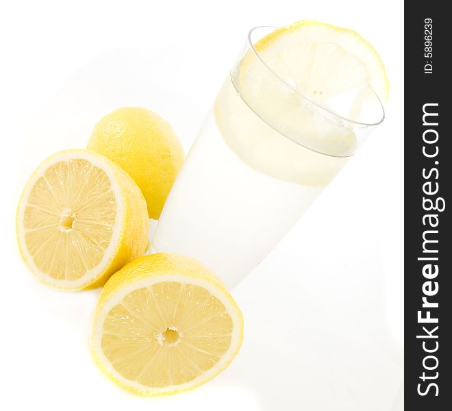 Lemonade with lemons isolated on white