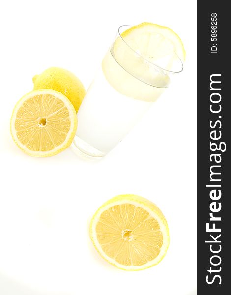 Lemonade with lemons isolated on white