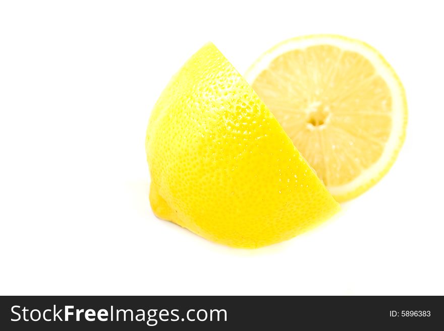 Yellow lemons isolated on white