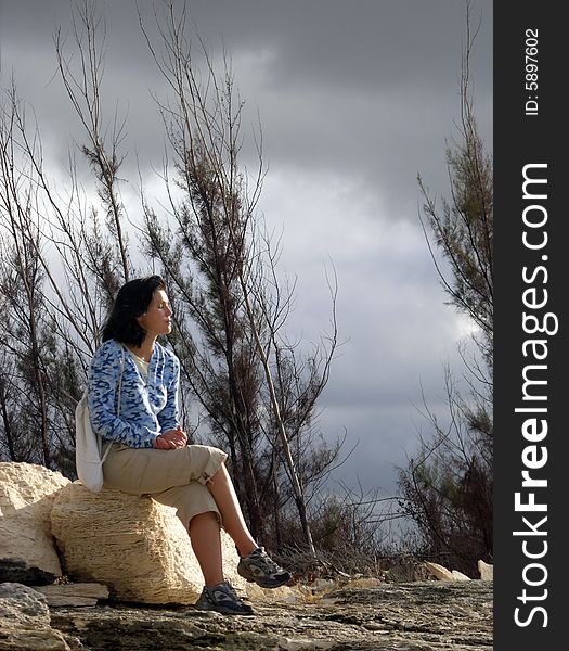 Sitting On A Stone