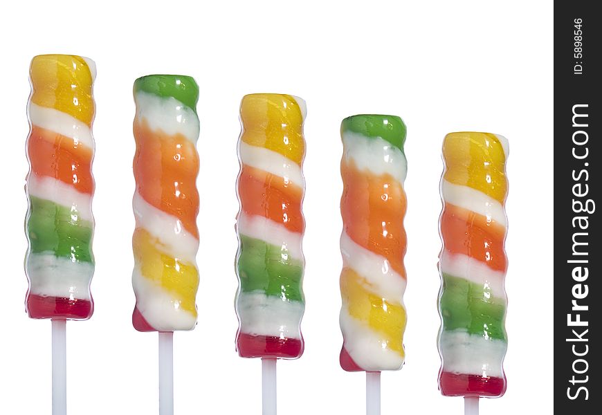 Five lollipop sticks isolated over white background.